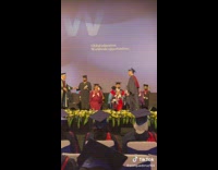 Guy at graduation ceremony gets his diploma and then yells SIUU 
