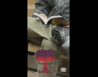 Train passenger reads book about bombs 