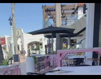 Girl poses on broken escalator