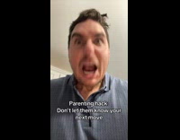 Dad preventing toddler from crying