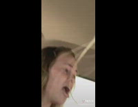 Girl mock boy outside hummer 