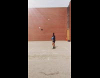 Guy catches soccer ball with foot