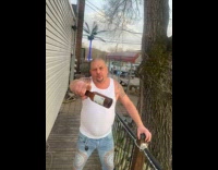 Man attempts shatter bottle on head failed