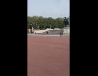 Girl blue dress sit stairs gold statue