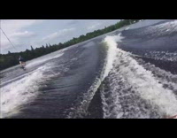 Girl wakeboard falls forward on face lake 
