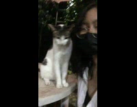 Pet cat bites owner on the side of her face