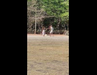 Woman hold hands with the photographer in front of the pyramid