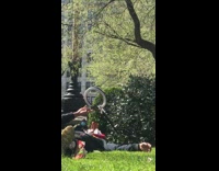 Person Films Themselves with Hot Dogs on Face 