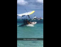 Parasail raft boat flies water ocean beach