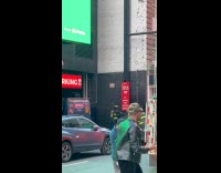 Collab IITW - Woman jean outfit poses behind the firetruck