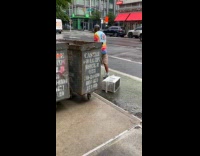 Collab WINY - Man dragging air-condition unit on street 