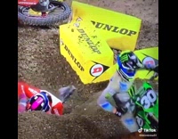 Dirt biker gets bumped in the head 