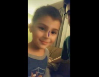 Girl hits little boy face purple butterfly