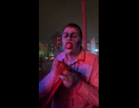 Zombie pretends to lick fake amputated foot