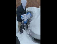 Guy uses little kid to wipe snow