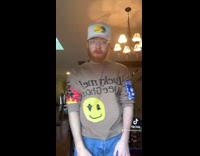 Guy shows off his tiny arm tattoo 