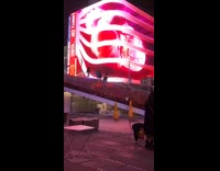 Four friends dance on stairs times square 