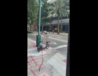 Goth girl lay ground bus lane scooter