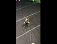 Girl jumps off rock climbing wall 