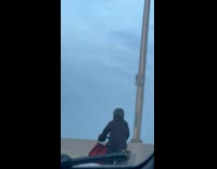 Collab WINY - Man Rides Bicycle Towards Bridge on Road