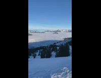 Guy goes skiing in Austria with a nice view 