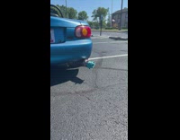 Pig toy on car exhaust gets launched