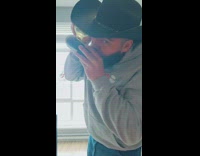 Guy chugs bottle of wine through can 