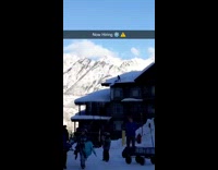 Guy shovels snow off rooftop 