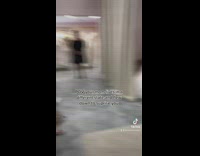 Lady Surprised by Her Mom at Dress Shop