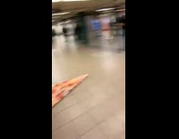 Rat costume guy crawls around subway station 