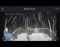 Security cam footage of guy slipping on porch steps