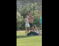 Couple hug and slowly hold hands park