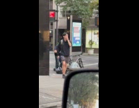 Collab WINY - Man shave head on street Link NYC board