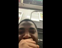 Guy wears black 8 ball jacket and passenger laughs at him