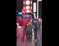 Guy with red hair gets haircut in Times Square