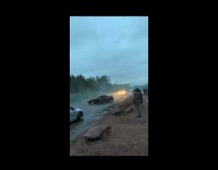 Guy falls out black car rolls away 