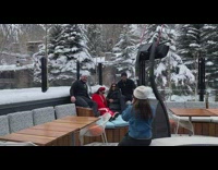 Group photo fire pit couch red jacket