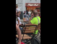 Three women tiktok dance in front of Pizza Hut