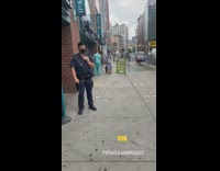 Grey camouflage sweater guy baby yoda sidewalk 