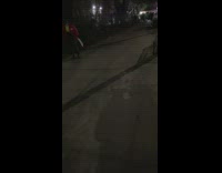 Guy in Red Sings on Sidewalk Yelling 