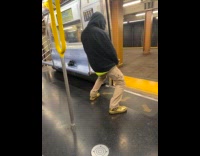 Collab Subway Creatures - Man black jacket gold shoes do humping movements on train door
