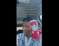 Girl picking up starbucks drink 