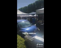 Girls car stuck in farmers market