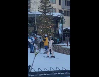 Woman shiny ski coat jacket snow selfie