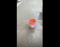 Girl walks on wet cement sidewalk fail 