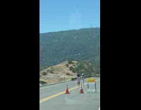 White bucket hat girl orange traffic cones