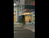 Red pants guy plays trumpet rides bicycle 