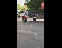 Guy in electric wheel chair pulling guy on office chair while other guy rides on back