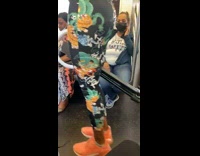 Lady with ring light between legs 