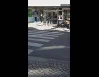 Girl black jacket lean pharmacy glass door